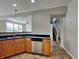 Well-equipped kitchen featuring stone countertops, stainless steel appliances, and modern cabinetry at 19533 Chip Shot Rd, Noblesville, IN 46062