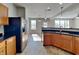 Updated kitchen with stainless steel appliances, granite countertops, and an open layout at 19533 Chip Shot Rd, Noblesville, IN 46062