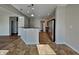 Contemporary kitchen with stainless steel appliances, a breakfast bar, and open access to the living area at 19533 Chip Shot Rd, Noblesville, IN 46062