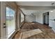 Spacious living room with modern doors offering outdoor access and plenty of natural light at 19533 Chip Shot Rd, Noblesville, IN 46062