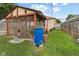 View of the yard, patio with plants, trees, and greenery at 2017 E Legrande Ave, Indianapolis, IN 46203