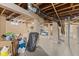 Unfinished basement with painted ceiling and walls, exposing ducts and pipes at 2017 E Legrande Ave, Indianapolis, IN 46203