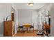 Cozy dining area featuring a table for two, lots of natural light, and a storage cabinet at 2017 E Legrande Ave, Indianapolis, IN 46203