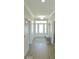 Bright foyer featuring hardwood floors and white trim at 204 St Andrews Ave, Edinburgh, IN 46124