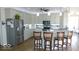 Modern kitchen with stainless steel appliances, granite countertops and wooden bar stools at 204 St Andrews Ave, Edinburgh, IN 46124