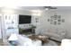 Comfortable living room with fireplace, entertainment center and neutral decor at 204 St Andrews Ave, Edinburgh, IN 46124