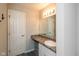 This bathroom features a vanity and a large mirror at 2578 Chaseway Ct, Indianapolis, IN 46268