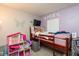 bedroom features colorful decor, a tv, and good natural light at 2578 Chaseway Ct, Indianapolis, IN 46268