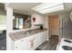 Bright kitchen features stainless appliances, plenty of countertop space, and is filled with natural light at 2578 Chaseway Ct, Indianapolis, IN 46268