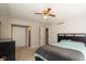 This main bedroom features a closet, doorway to bathroom, and a ceiling fan at 2578 Chaseway Ct, Indianapolis, IN 46268