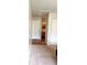 Carpeted bedroom view into bathroom with tile floors and access to storage on ceiling at 2770 Two Worlds Dr, Columbus, IN 47201