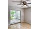 Bright room with ceramic tile flooring and access to backyard through a sliding glass door at 2770 Two Worlds Dr, Columbus, IN 47201