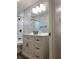 Updated bathroom with hexagonal tile, modern vanity, and sleek black fixtures at 2822 Tindall St, Indianapolis, IN 46203