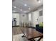 Bright dining area near the kitchen and living room, featuring a table with seating for four at 2822 Tindall St, Indianapolis, IN 46203