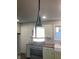 Kitchen featuring pendant lighting, stainless appliances, butcher block counters, and a farmhouse sink at 2822 Tindall St, Indianapolis, IN 46203