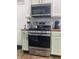 Modern kitchen featuring stainless steel appliances, wooden countertops, and stylish cabinets at 2822 Tindall St, Indianapolis, IN 46203