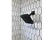 Modern walk-in shower with a black rainfall showerhead and white hexagon tile surround at 2822 Tindall St, Indianapolis, IN 46203