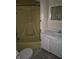 Bathroom with a shower, toilet, and vanity at 3216 Memorial N Dr, Elwood, IN 46036