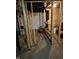 Unfinished basement with exposed framing, visible ductwork, and concrete flooring at 3711 Hillside Ave, Indianapolis, IN 46218