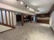 Large finished basement with recessed lighting, pool table area, and wood-paneled wall details at 4675 N Riverside Dr, Columbus, IN 47203