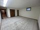 Bedroom featuring new carpet, closet, and a window providing lots of natural light at 4675 N Riverside Dr, Columbus, IN 47203