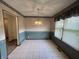 Dining room featuring traditional wallpaper and chandelier lighting at 4675 N Riverside Dr, Columbus, IN 47203