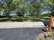 Street view showing mature trees and mailbox numbered 4575 at 4675 N Riverside Dr, Columbus, IN 47203