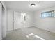 Bright bedroom featuring neutral carpet, a window providing natural light, and fresh, white walls at 4765 E 200 N, Anderson, IN 46012