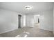 A well-lit bedroom includes a closet and two doorways creating an open-concept design at 4765 E 200 N, Anderson, IN 46012