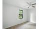 Bedroom with a view of a window and carpet at 4765 E 200 N, Anderson, IN 46012