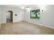 Inviting living room with hardwood floors, abundant natural light, and contemporary fixtures at 4765 E 200 N, Anderson, IN 46012