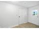 A clean, bright room with two doors, offering plenty of natural light at 4765 E 200 N, Anderson, IN 46012