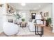 Bright and airy living room with fireplace, stylish decor, and seamless flow into other living spaces at 5930 Broadway St, Indianapolis, IN 46220