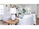 Cozy living room with comfortable seating, a fireplace, and plenty of natural light at 5930 Broadway St, Indianapolis, IN 46220