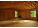 Unfinished room is framed and ready to be built out with natural light from two windows at 5930 Broadway St, Indianapolis, IN 46220