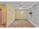 Bright bedroom with built-in shelving and neutral carpet at 6928 Shoals Way, Indianapolis, IN 46237