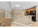 This kitchen features a breakfast bar, stainless steel appliances, and lots of natural light at 6928 Shoals Way, Indianapolis, IN 46237