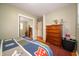This bedroom features ample storage space, neutral walls and carpet, and a bright, airy feel at 7224 N Tuxedo St, Indianapolis, IN 46240
