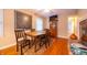 Charming dining room features hardwood floors, a fireplace, and ample space for Gathering gatherings at 7224 N Tuxedo St, Indianapolis, IN 46240