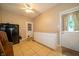 This spacious mudroom features a utility sink, storage cabinets, and multiple entry points at 7224 N Tuxedo St, Indianapolis, IN 46240