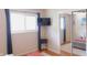 This is a bright bedroom with a comfy lounging chair mirrored closet doors at 7326 Lowe Dr, Lawrence, IN 46226