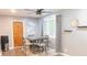 This dining room has modern gray furniture and stylish accents at 7326 Lowe Dr, Lawrence, IN 46226