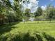 Backyard with a pond view with a fence at 7450 Cobblestone W Dr, Indianapolis, IN 46236