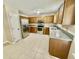 Spacious kitchen with updated appliances, granite countertops, and ample cabinet space at 7450 Cobblestone W Dr, Indianapolis, IN 46236