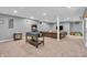 Spacious finished basement offering a pool table, arcade game, and lounge area at 7830 Cross Creek, Avon, IN 46123