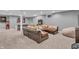 Finished basement features a large sofa, arcade game, and recessed lighting at 7830 Cross Creek, Avon, IN 46123