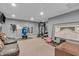Finished basement area with workout equipment and comfortable lounge area at 7830 Cross Creek, Avon, IN 46123