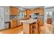 Eat-in kitchen featuring an island, stainless steel appliances, and warm wood cabinets at 7830 Cross Creek, Avon, IN 46123
