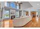 Bright living room with hardwood floors, fireplace and views to the backyard at 7830 Cross Creek, Avon, IN 46123