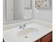 Close-up of a bathroom vanity featuring a mirror and a sink at 882 Lincoln Park W Dr, Greenwood, IN 46142